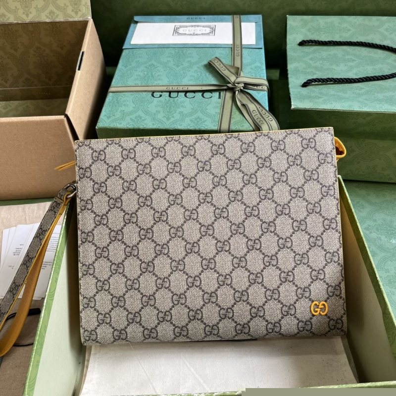 G*u*i clutch bags